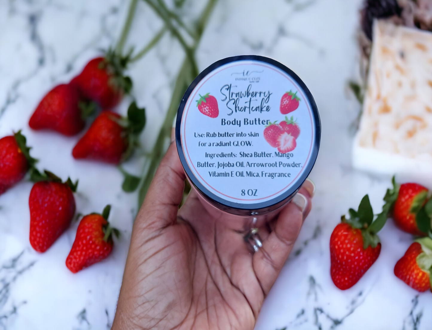 a jar of strawberry shortcake body butter